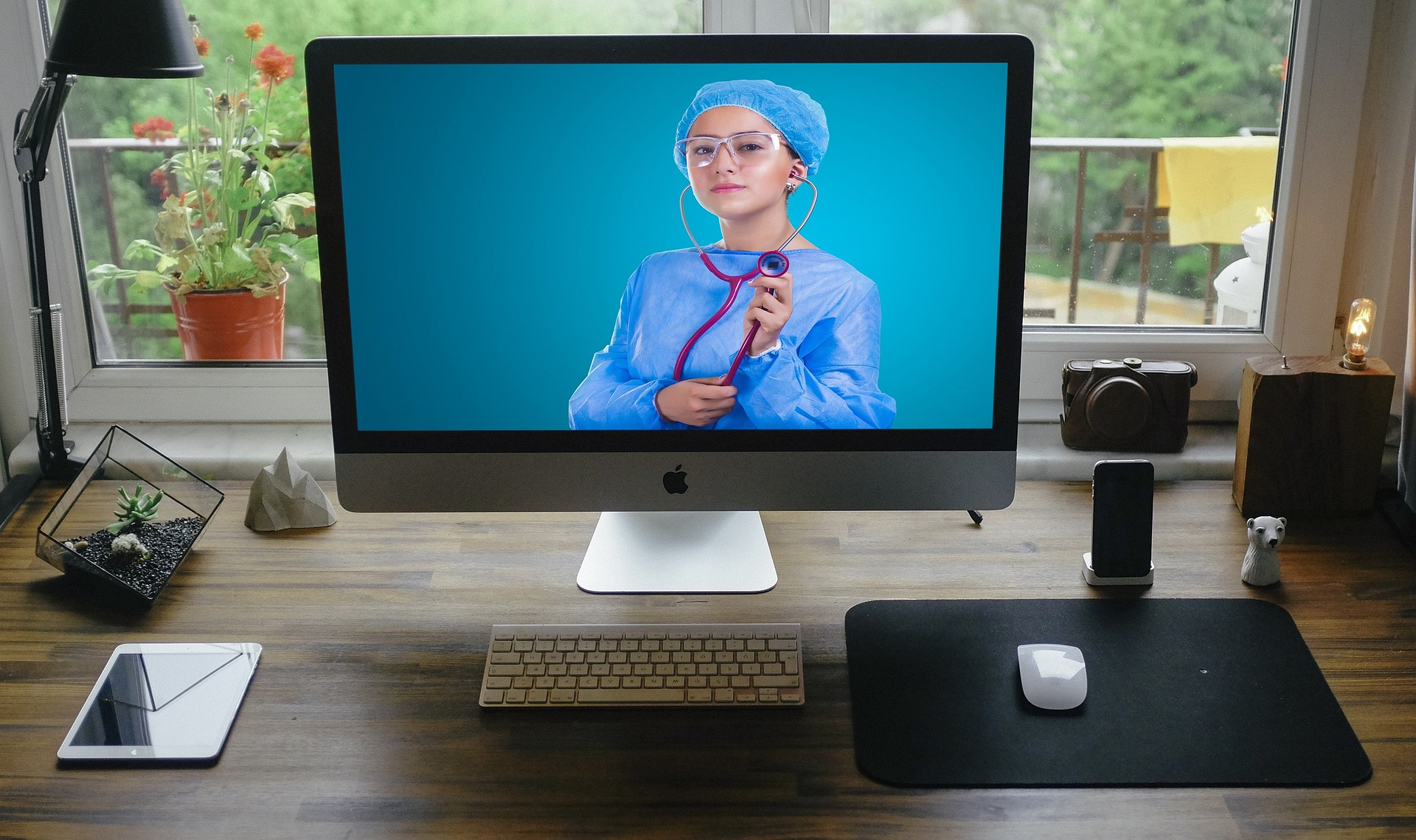 A computer monitor showing a doctor